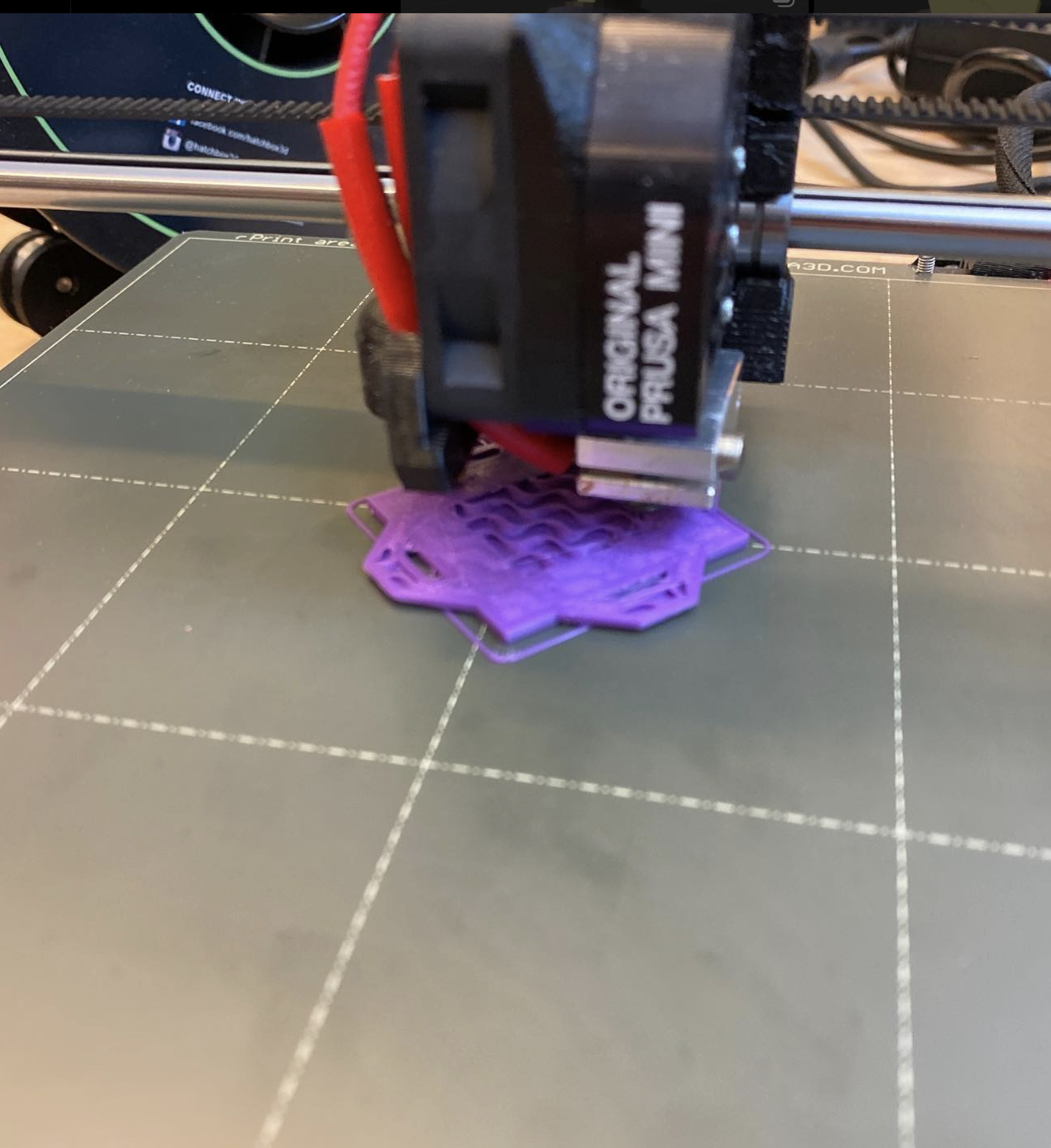 A Genshin Vision, in the process of being printed